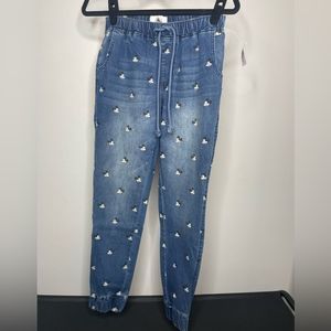 NWT Disney parks, jeans size small with Mickey, print all over